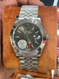 Rolex Datejust in Stainless Steel with Dark Grey Dial and Red Accent