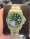 rolex-submariner-date-in-yellow-gold-with-green-dial-and-bezel