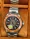 omega-seamaster-planet-ocean-600m-greyblack-dial-orange-bezel-mens-watch